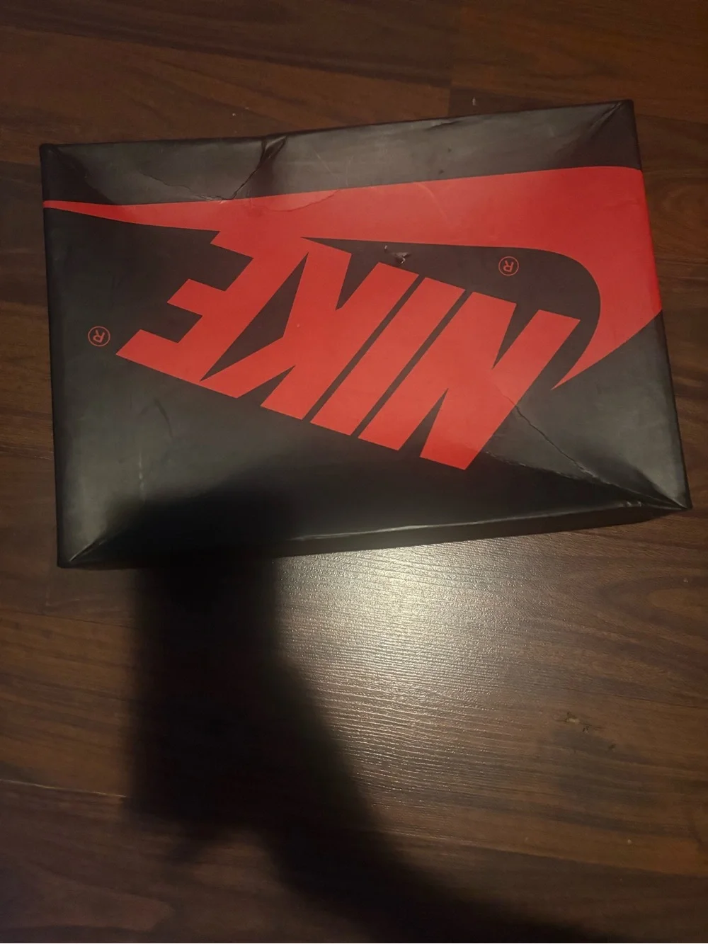 Nike Black Box with Red Swoosh Logo